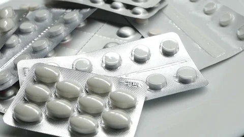 Many different pills tablet blister packages rotate 動画素材 83692277