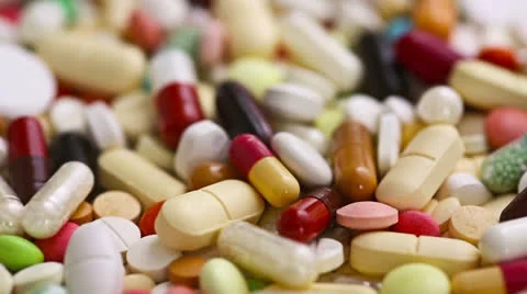 Many different pills turning Stock Footage 23304584