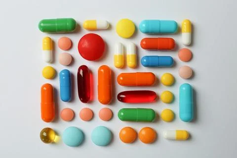 Many different pills on white background, top view Stock Photos