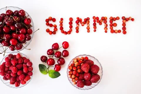 Many different red berries on the table, top view Stock Photos