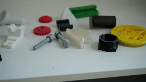 Many different shapes created on a 3D printer. 3D technology. Stock Footage 311797318