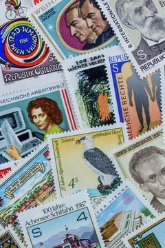 Many different stamps lying next to each other, collecting as a hobby. Studio Photos