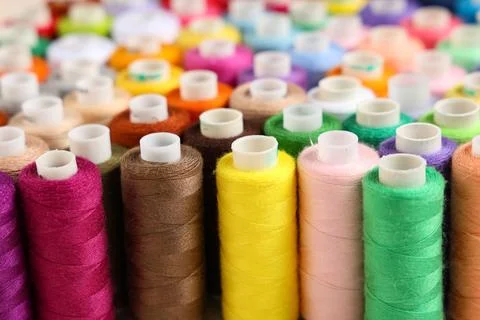 Many different thread spools as background 写真素材