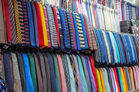 Many different ties of multi colors on display at the exhibition showcase. Large 스톡 사진