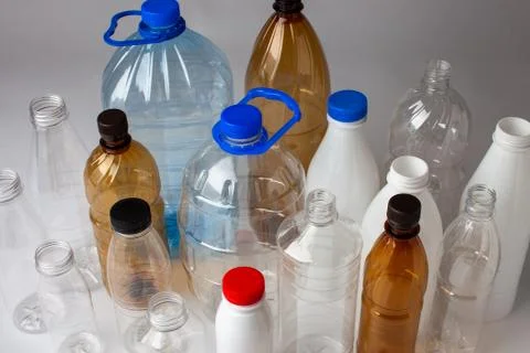 Many different transparent multicolored plastic new bottles Stock Photos