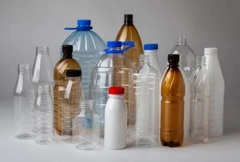 Many different transparent multicolored plastic new bottles Stock Photos