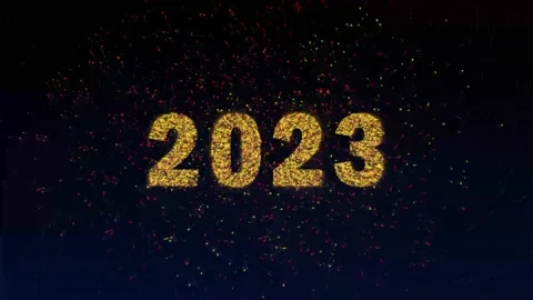 Many different yellow fireworks and the inscription 2023. New year Stock Footage 218184351