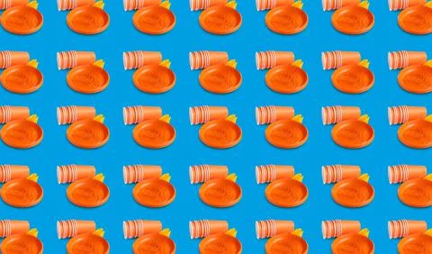 Many disposable tableware on turquoise background. Seamless pattern design 스톡 사진