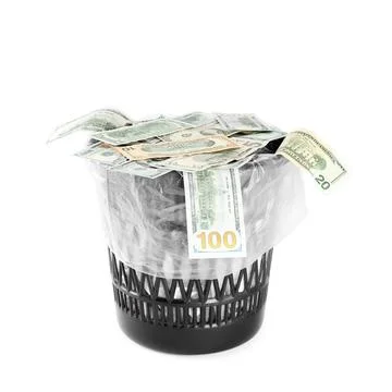 Many dollar banknotes in trash bin isolated on white Fotos Stock