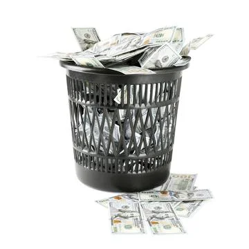 Many dollar banknotes in trash bin isolated on white Fotos Stock