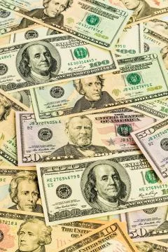 Many dollar bills Stock Photos