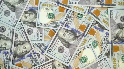 Many dollars are rotating. Spinning background of money. Hape of a cash turning. Stock Footage 94005807