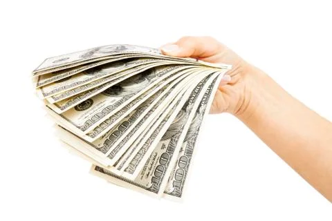 Many dollars falling on woman's hand with money Stockfoto's