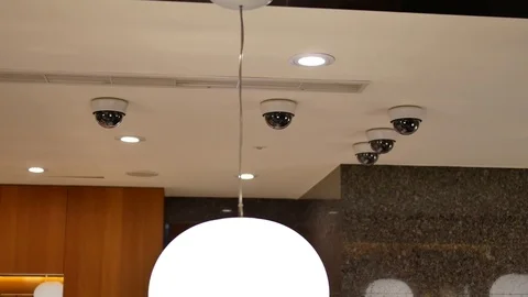 Many dome security cameras on top of ceiling inside store with 4k resolution Stock Footage 81724105