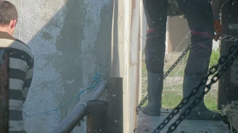 Many ducks in duck farm. Workers collect load ducks on a truck from a duck farm. Stock Footage 128211440