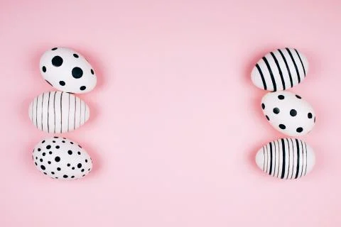 Many easter eggs on pink. Flat lay. Stock Photos