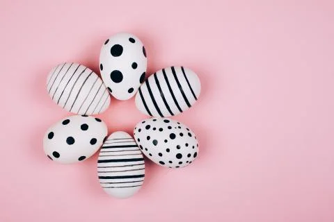 Many easter eggs on pink. Flat lay. Stock Photos
