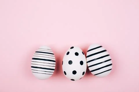 Many easter eggs on pink. Flat lay. Stock Photos