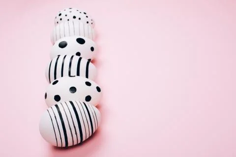 Many easter eggs on pink. Flat lay. Stock Photos