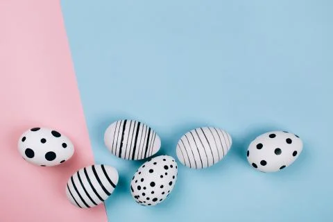 Many easter eggs on pink. Flat lay. Stock Photos