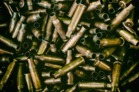 Many empty bullet shells, pile of used rifle cartridges 7.62 mm caliber, assa Stock Photos