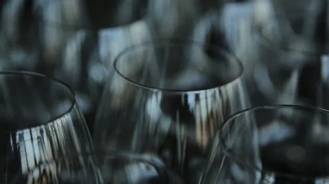 Many empty crystal wine glasses stands on table Stock Footage 65734565