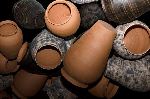 Many empty handmade clay pots close up Stock Photos