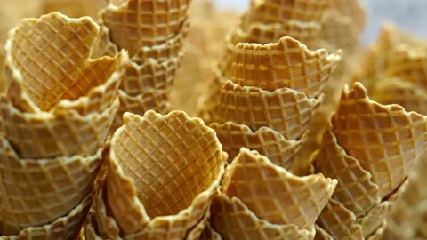 Many empty ice cream waffle cones,  background Stock Footage 137830357