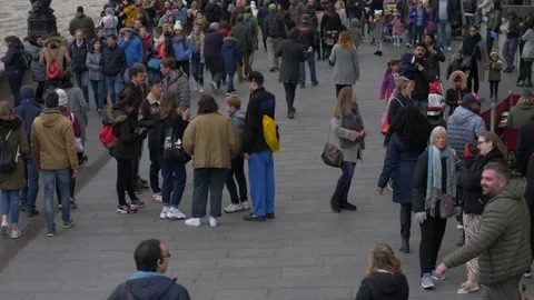 Many faces in a crowded London slow motion 4K Stock Footage 201065043