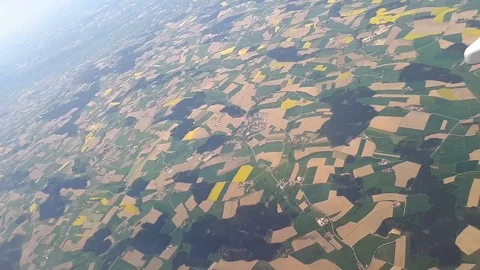 Many farm fields, view from an airplane Видео 101065919