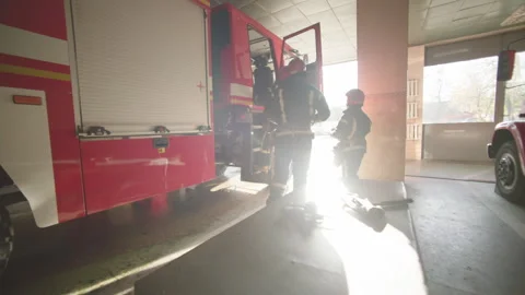 Many Firefighters preparing to go Stock Footage 283142638