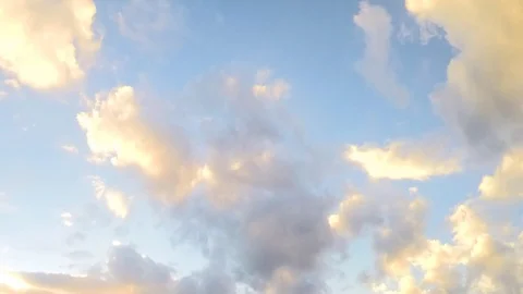 Many floating sunset clouds in the sky timelapse 스톡 동영상 82981039