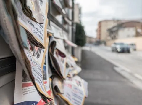 Many flyers in mailboxes Stock Photos