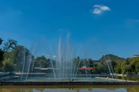 Many fountain  with different programme  in public garden Stock Photos