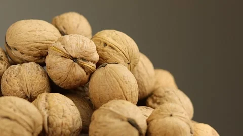 Many fresh walnuts rotating around Video stock 167338163