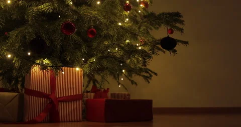 Many gift boxes and christmas decorations under a beautiful decorated christmas  Video stock 146284466