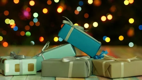 Many gift boxes on bokeh lights background Stock Footage 122688990
