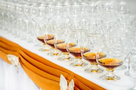Many glasses on buffet table Stock Photos
