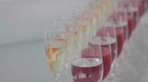 Many glasses of champagne on the table Stock Footage 45792219