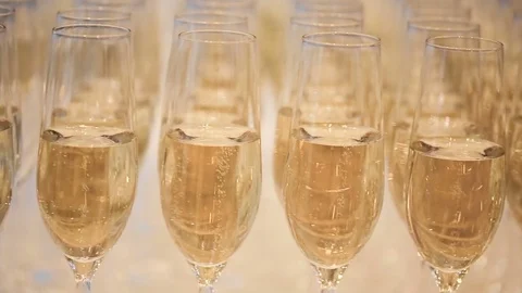 Many glasses of champagne on the table Video stock 74567033