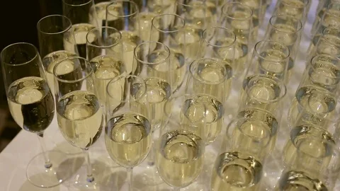 Many glasses of champagne on the table Video stock 74567098