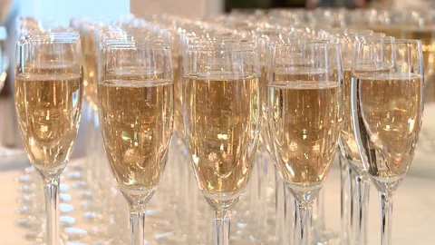Many glasses of champagne on the table, sequence Stock Footage 76034685