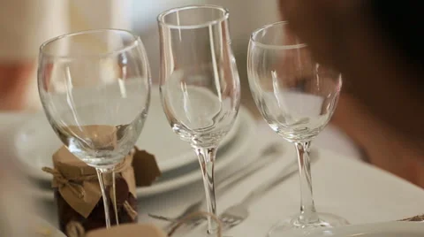 Many Glasses. Waiter serving tables for cocktail party with champagne Stock Footage 65957639