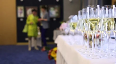 Many glasses of wine are on the table with wine bottle Stock Footage 52815640