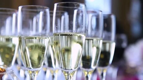 Many glasses of wine are on the table with wine bottle Stock Footage 52815719