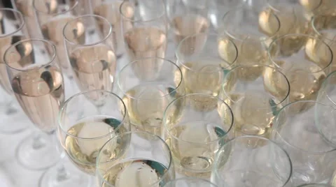 Many glasses of wine are on the table with wine bottle Stock Footage 52816054