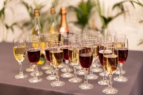 Many glasses of wine on the table buffet Stock Photos