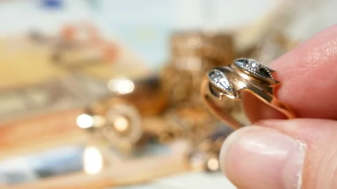 Many golden and silver jewerly and money, pawnshop concept, jewerly shop conc Stock Footage 144555853