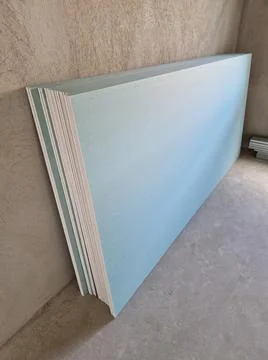 Many green drywall sheets for constructions Foto stock