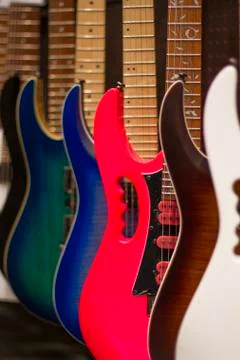 Many guitars hanging Stock Photos